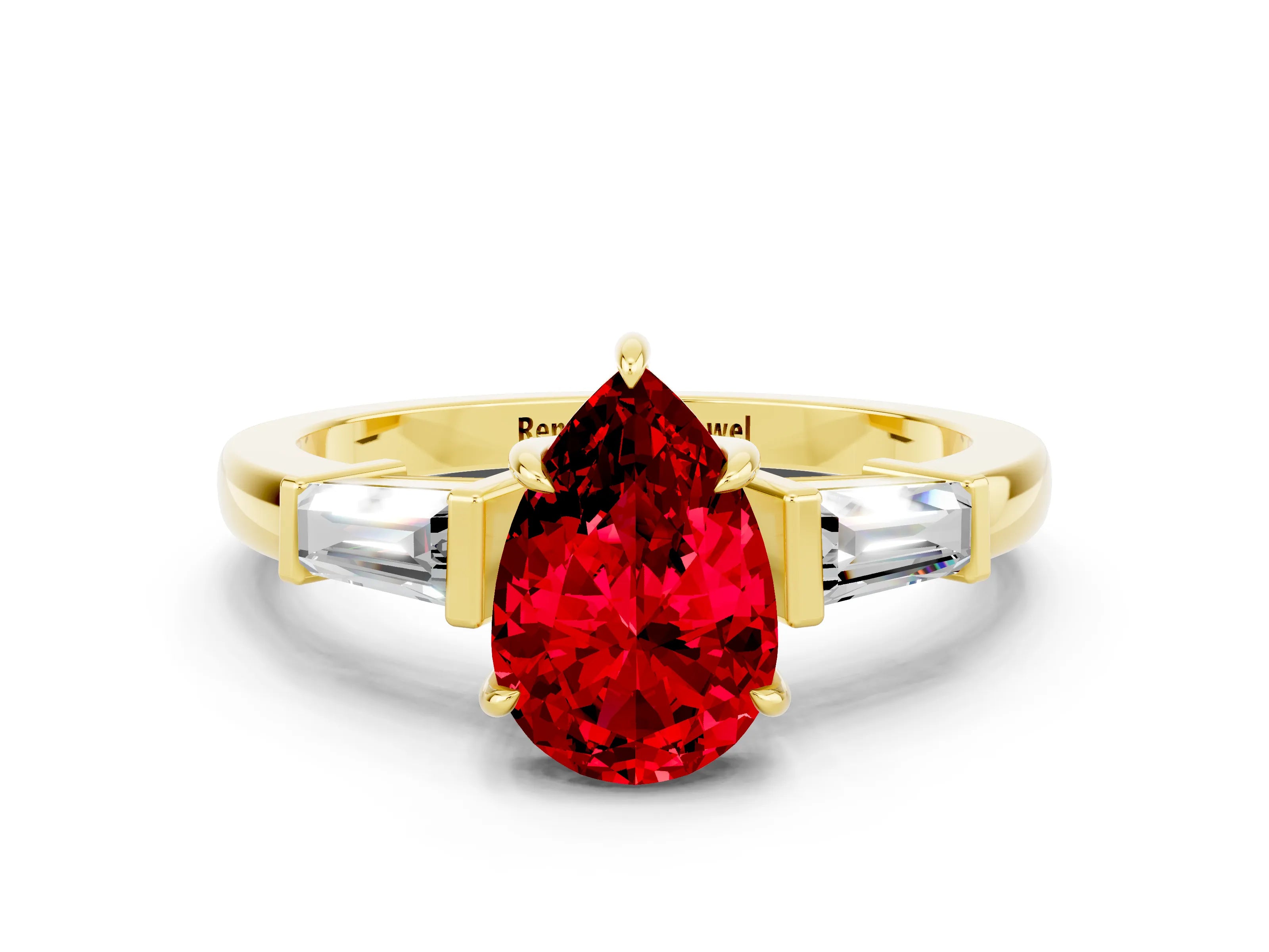 Yellow gold Pear Cut Cut Diamond Ring with Tapered Baguette Side Stones in Four-Prong Setting
