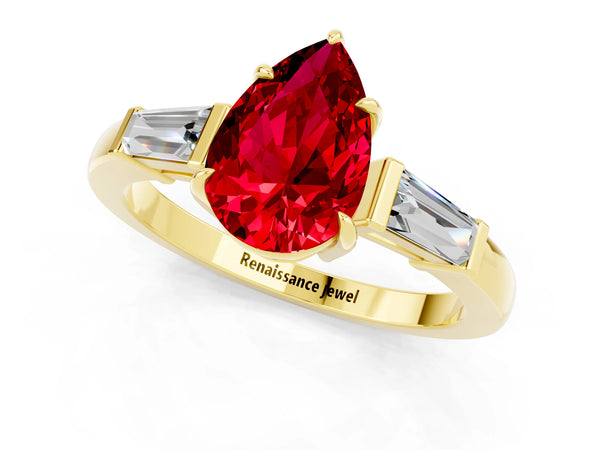 Yellow gold Pear Cut Cut Diamond Ring with Tapered Baguette Side Stones in Four-Prong Setting