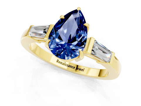 Yellow gold Pear Cut Cut Diamond Ring with Tapered Baguette Side Stones in Four-Prong Setting_1
