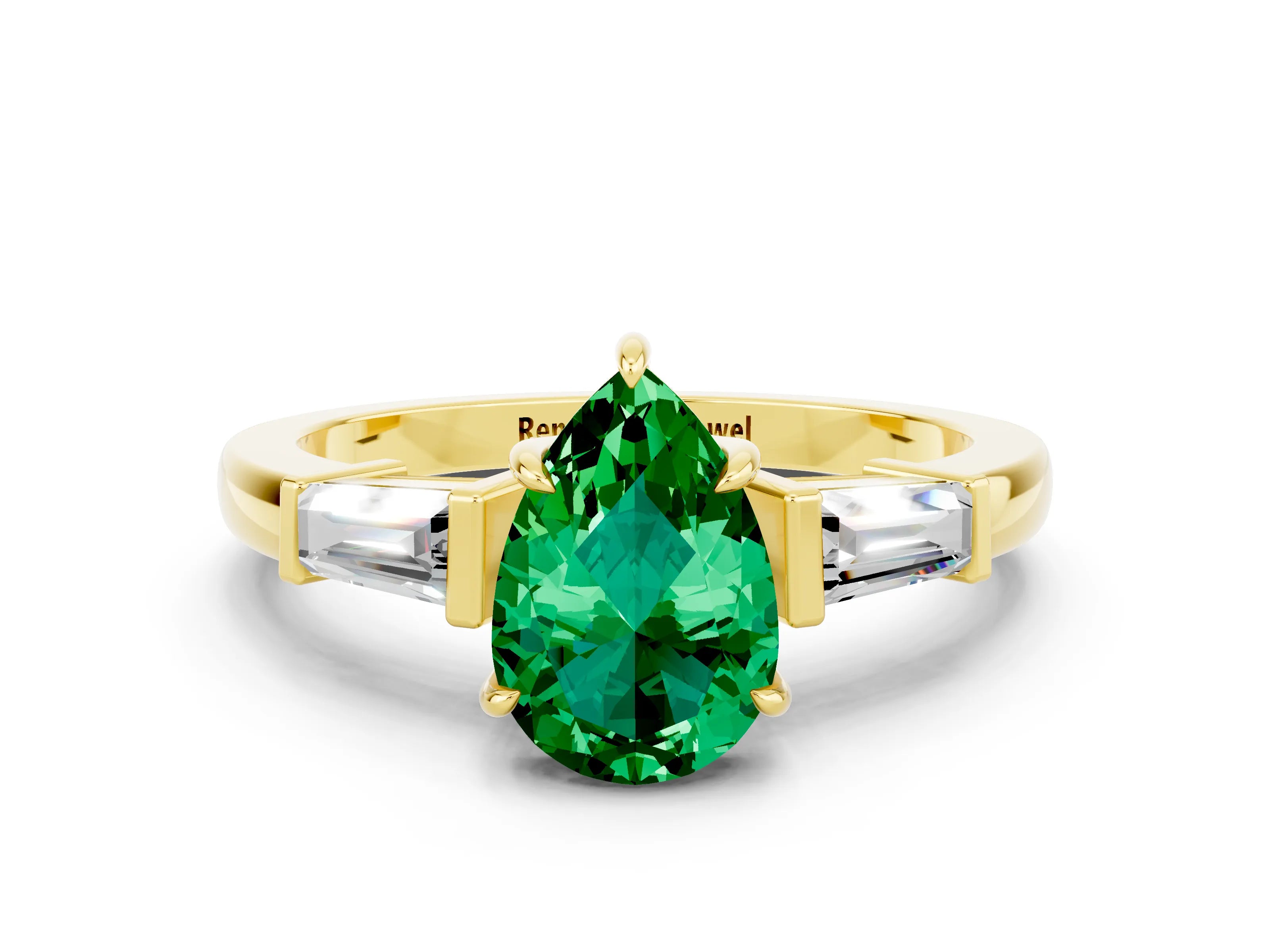 Yellow gold Pear Cut Cut Diamond Ring with Tapered Baguette Side Stones in Four-Prong Setting