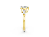 Yellow gold Pear Cut Cut Diamond Ring with Tapered Baguette Side Stones in Four-Prong Setting_2