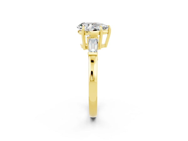 Yellow gold Pear Cut Moissanite Three-Stone Ring with Tapered Baguette Side Stones and Prong Setting