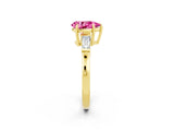 Yellow gold Pear Cut Cut Diamond Ring with Tapered Baguette Side Stones in Four-Prong Setting_2