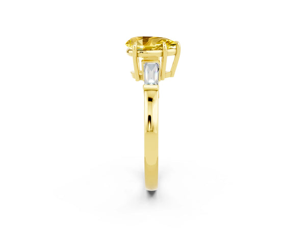 Yellow gold Pear Cut Yellow Sapphire Three-Stone Ring with Tapered Baguette Side Stones and Prong Setting