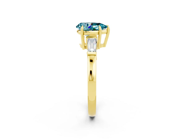 Yellow gold Pear Cut Cut Diamond Ring with Tapered Baguette Side Stones in Four-Prong Setting