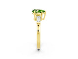 Yellow gold Pear Cut Cut Diamond Ring with Tapered Baguette Side Stones in Four-Prong Setting_2