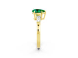 Yellow gold Pear Cut Cut Diamond Ring with Tapered Baguette Side Stones in Four-Prong Setting_2