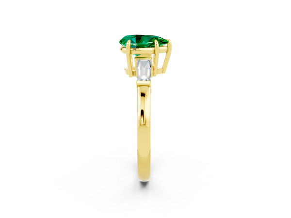 Yellow gold Pear Cut Emerald Three-Stone Ring with Tapered Baguette Side Stones and Prong Setting