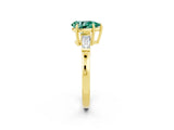 Yellow gold Pear Cut Cut Diamond Ring with Tapered Baguette Side Stones in Four-Prong Setting_2