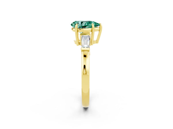 Yellow gold Pear Cut Green Sapphire Three-Stone Ring with Tapered Baguette Side Stones and Prong Setting