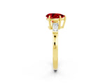 Yellow gold Pear Cut Cut Diamond Ring with Tapered Baguette Side Stones in Four-Prong Setting_2