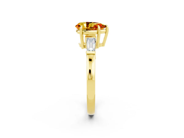 Yellow gold Pear Cut Citrine Three-Stone Ring with Tapered Baguette Side Stones and Prong Setting