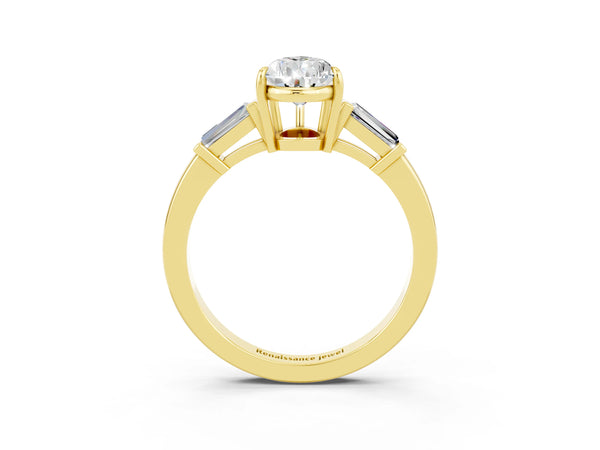 Yellow gold Pear Cut Moissanite Three-Stone Ring with Tapered Baguette Side Stones and Prong Setting