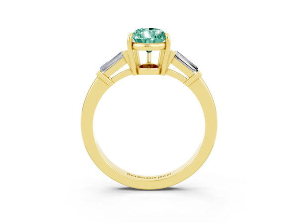 Yellow gold Pear Cut Green Sapphire Three-Stone Ring with Tapered Baguette Side Stones and Prong Setting