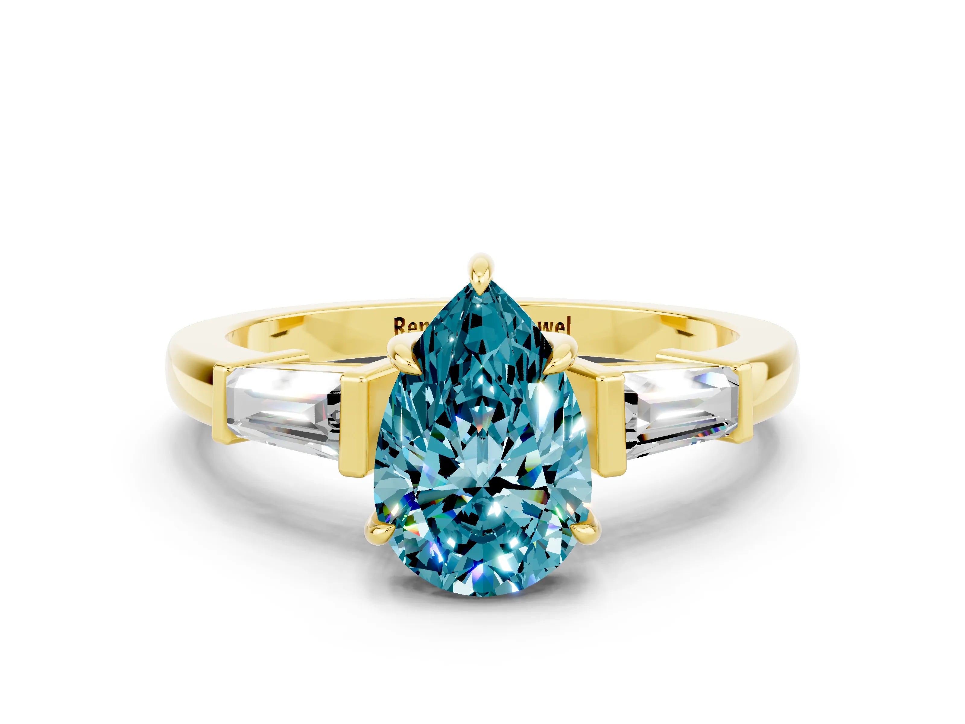 Yellow gold Pear Cut Cut Diamond Ring with Tapered Baguette Side Stones in Four-Prong Setting