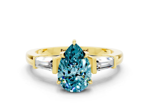 Yellow gold Pear Cut Cut Diamond Ring with Tapered Baguette Side Stones in Four-Prong Setting