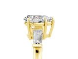 Yellow gold Pear Cut Cut Diamond Ring with Tapered Baguette Side Stones in Four-Prong Setting_5