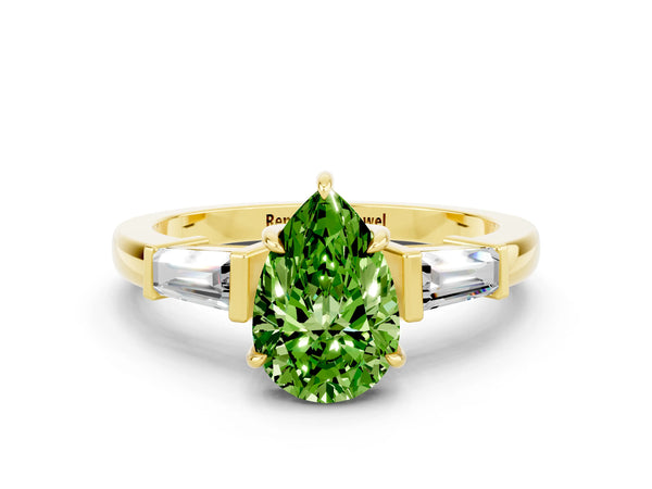 Yellow gold Pear Cut Cut Diamond Ring with Tapered Baguette Side Stones in Four-Prong Setting
