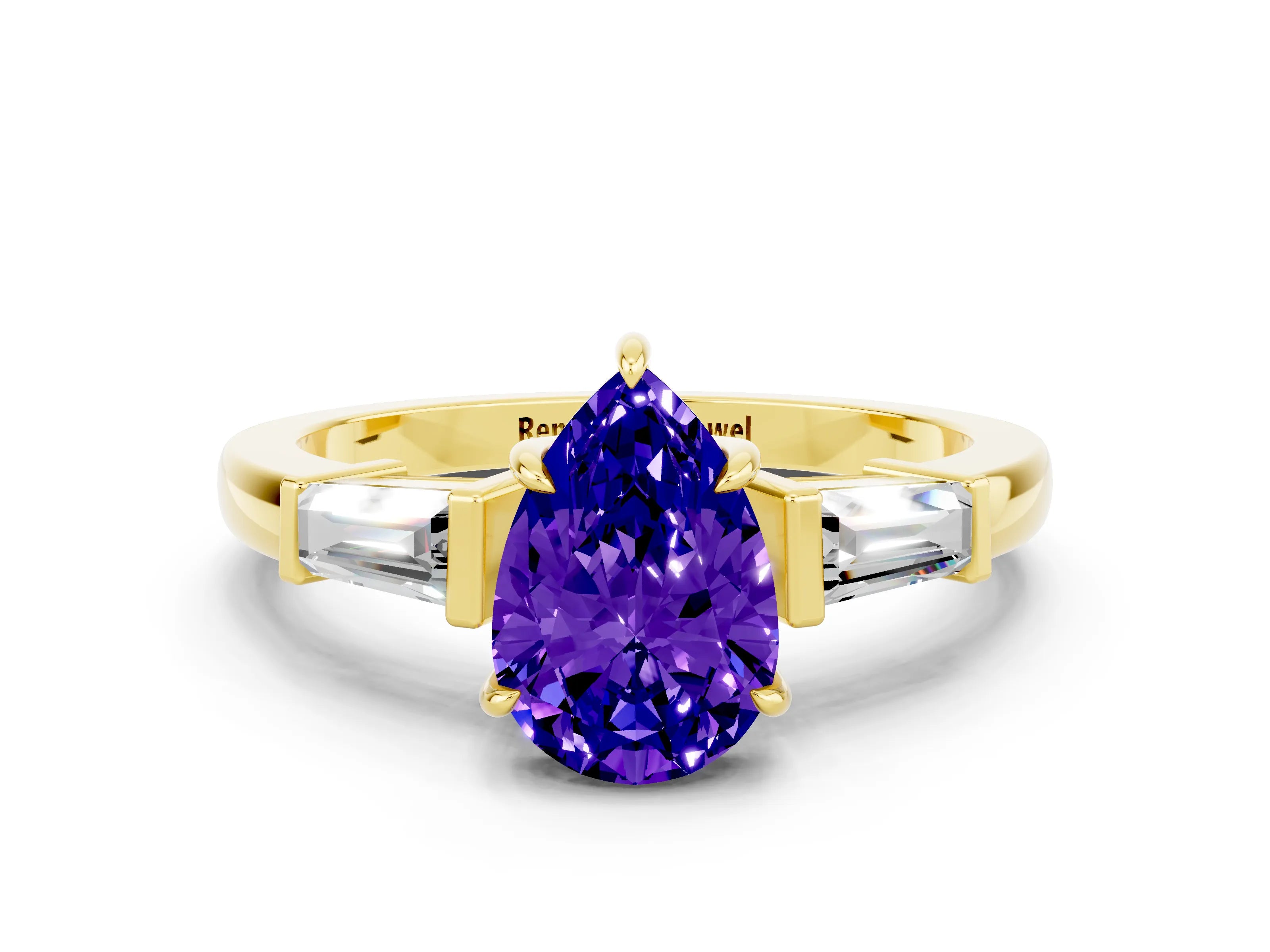 Yellow gold Pear Cut Cut Diamond Ring with Tapered Baguette Side Stones in Four-Prong Setting