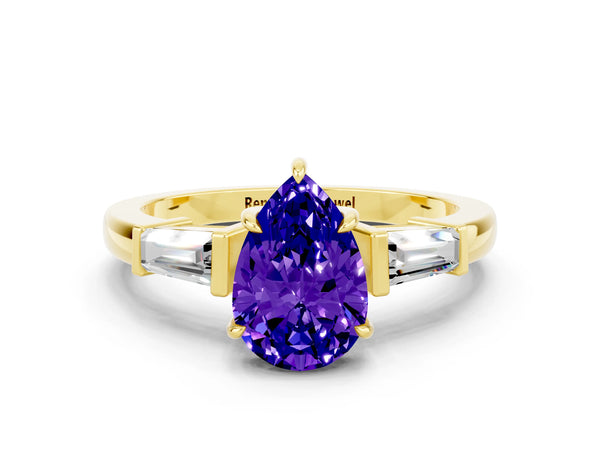 Yellow gold Pear Cut Tanzanite Three-Stone Ring with Tapered Baguette Side Stones and Prong Setting