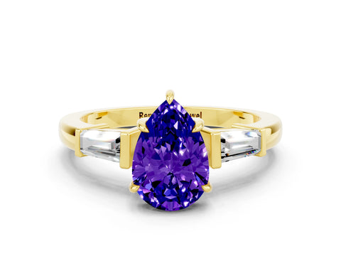 Yellow gold Pear Cut Cut Diamond Ring with Tapered Baguette Side Stones in Four-Prong Setting