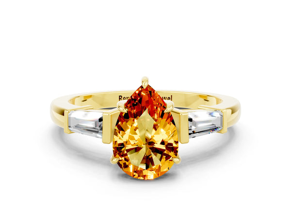 Yellow gold Pear Cut Citrine Three-Stone Ring with Tapered Baguette Side Stones and Prong Setting