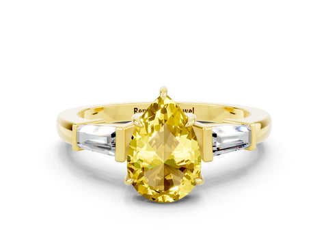 Yellow gold Pear Cut Cut Diamond Ring with Tapered Baguette Side Stones in Four-Prong Setting