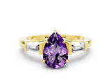 Yellow gold Pear Cut Cut Diamond Ring with Tapered Baguette Side Stones in Four-Prong Setting