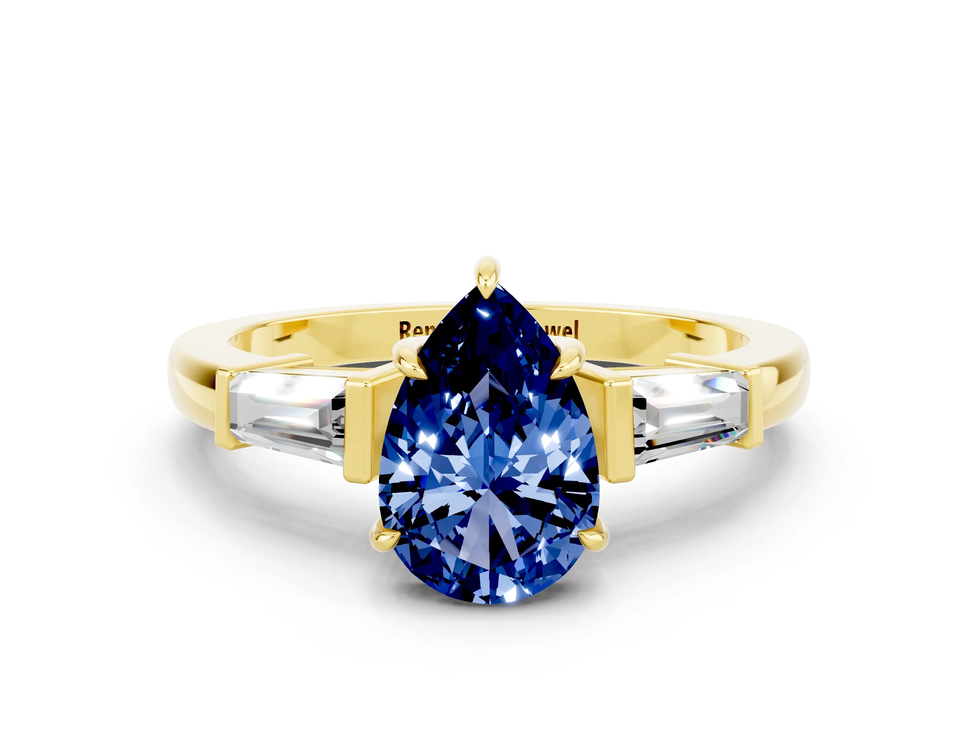Yellow gold Pear Cut Cut Diamond Ring with Tapered Baguette Side Stones in Four-Prong Setting