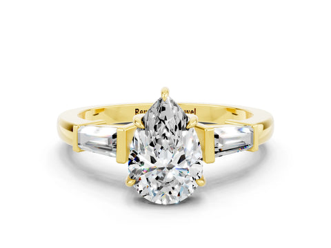 Yellow gold Pear Cut Cut Diamond Ring with Tapered Baguette Side Stones in Four-Prong Setting