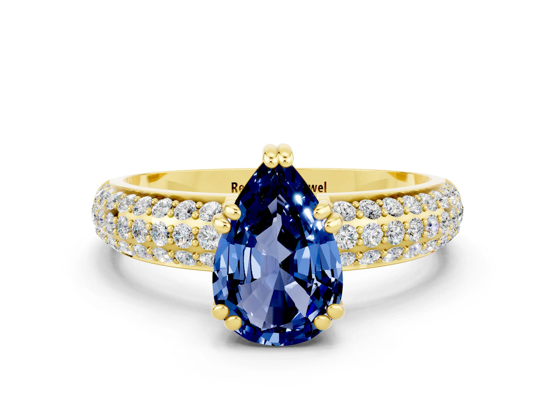 Yellow gold Pear Cut Cut Pave Diamond Engagement Ring with Channel Set Band and Four-Prong Setting