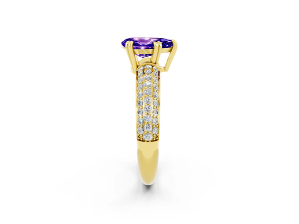 Yellow gold Pear Cut Tanzanite Solitaire Ring with Multi-Row Round Pavé Band and Prong Setting