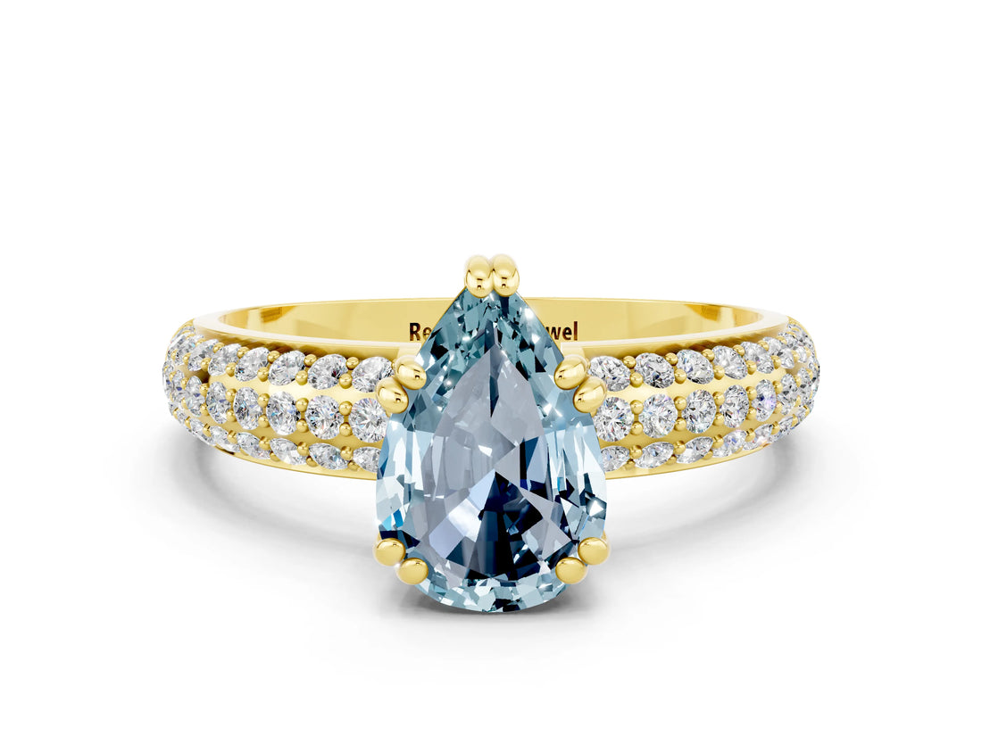Yellow gold Pear Cut Cut Pave Diamond Engagement Ring with Channel Set Band and Four-Prong Setting