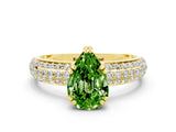 Yellow gold Pear Cut Cut Pave Diamond Engagement Ring with Channel Set Band and Four-Prong Setting
