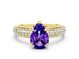 Yellow gold Pear Cut Cut Pave Diamond Engagement Ring with Channel Set Band and Four-Prong Setting