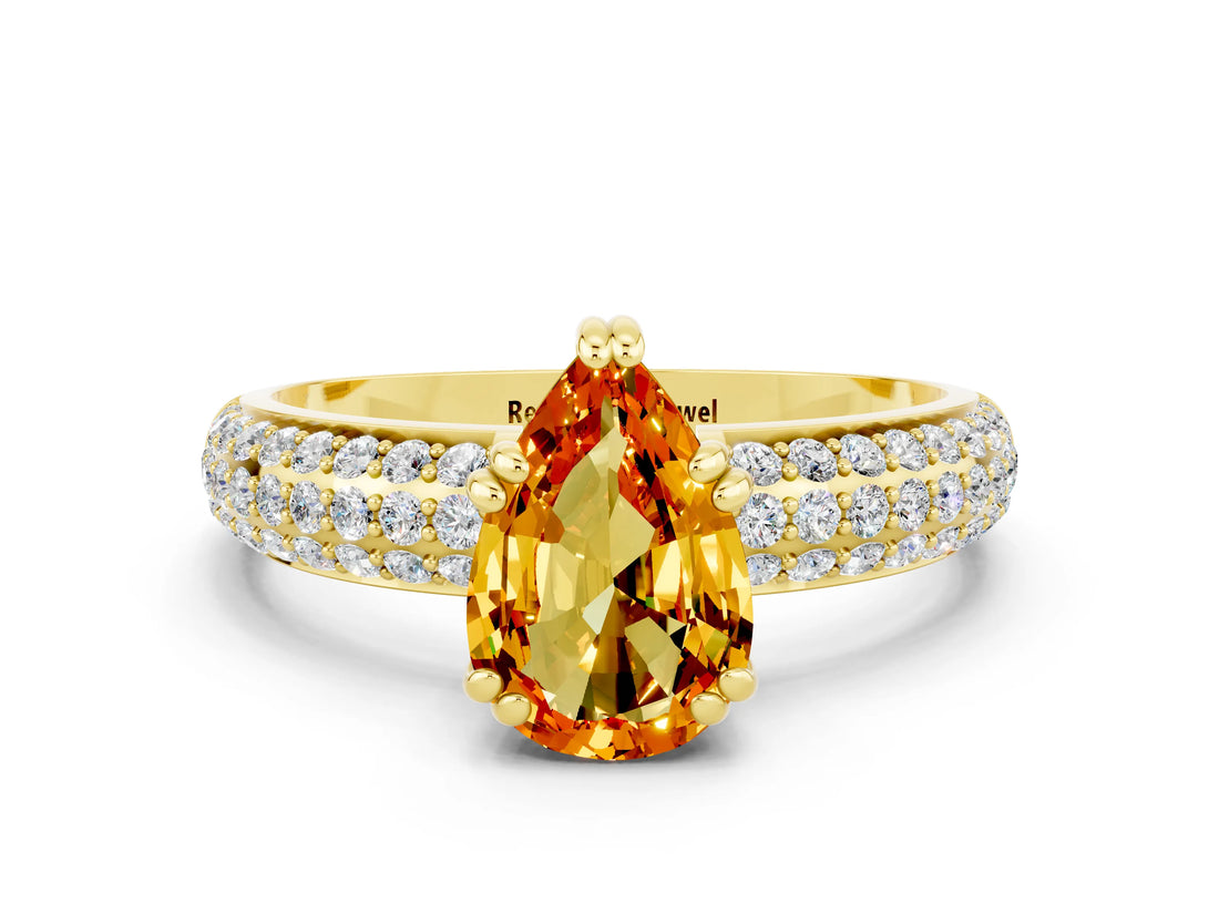 Yellow gold Pear Cut Cut Pave Diamond Engagement Ring with Channel Set Band and Four-Prong Setting