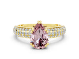 Yellow gold Pear Cut Cut Pave Diamond Engagement Ring with Channel Set Band and Four-Prong Setting