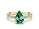 Yellow gold Pear Cut Cut Pave Diamond Engagement Ring with Channel Set Band and Four-Prong Setting