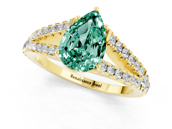 Yellow gold Pear Cut Green Sapphire Split Shank Engagement Ring with Round Pavé and Prong Setting