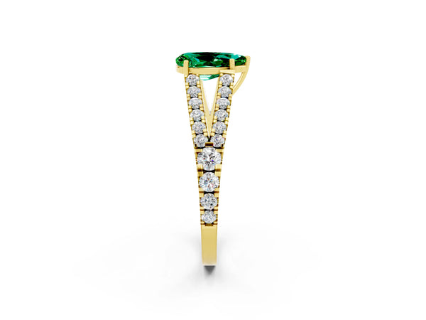 Yellow gold Pear Cut Emerald Split Shank Engagement Ring with Round Pavé and Prong Setting