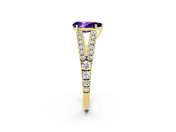Yellow gold Pear Cut Tanzanite Split Shank Engagement Ring with Round Pavé and Prong Setting