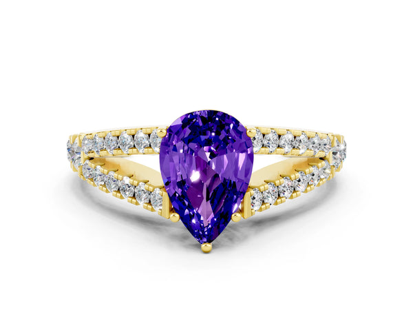 Yellow gold Pear Cut Tanzanite Split Shank Engagement Ring with Round Pavé and Prong Setting