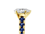 Yellow gold Pear Cut Diamond Cathedral Solitaire Ring with Round with Blue Sapphire side stone Pavé Band_17