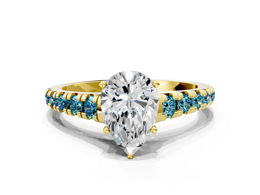 Yellow gold Pear Cut Diamond Cathedral Solitaire Ring with Round with Blue Topaz side stone Pavé Band
