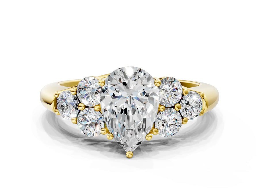 Yellow gold Pear Cut Diamond Cluster Ring with Round Accent Stones and Prong Setting on a Classic Band