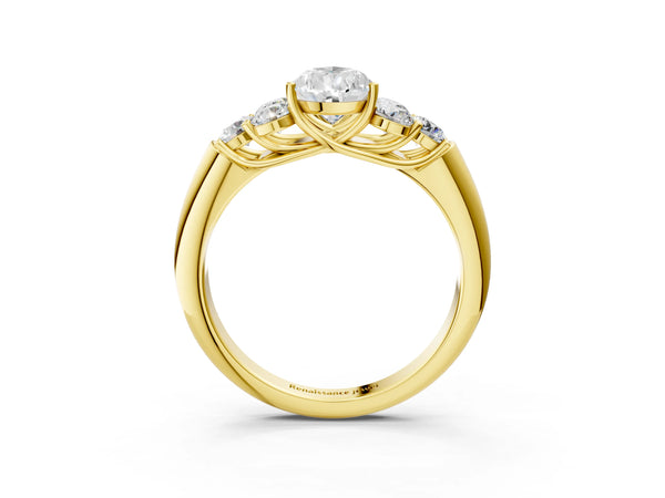 Yellow gold Pear Cut Diamond Cluster Ring with Round Accent Stones and Prong Setting on a Classic Band