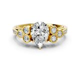 Yellow gold Pear Cut Diamond Engagement Ring with Bezel Set Round Side Stones and Prong Setting_62