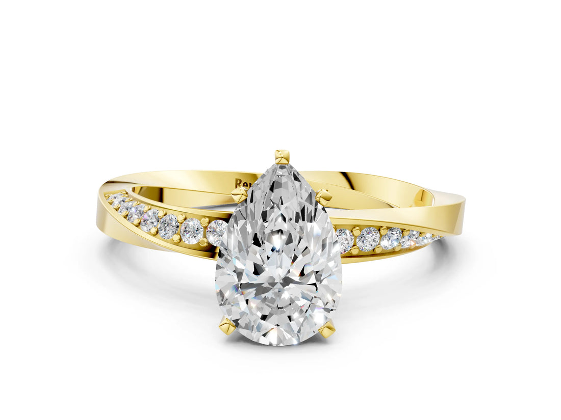 Yellow gold Pear Cut Diamond Engagement Ring with Side Stone Accents and Four-Prong Setting_61