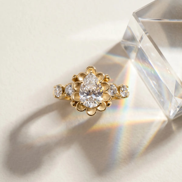 Yellow gold Pear Cut Diamond Floral Halo Engagement Ring with Shared Prong Setting