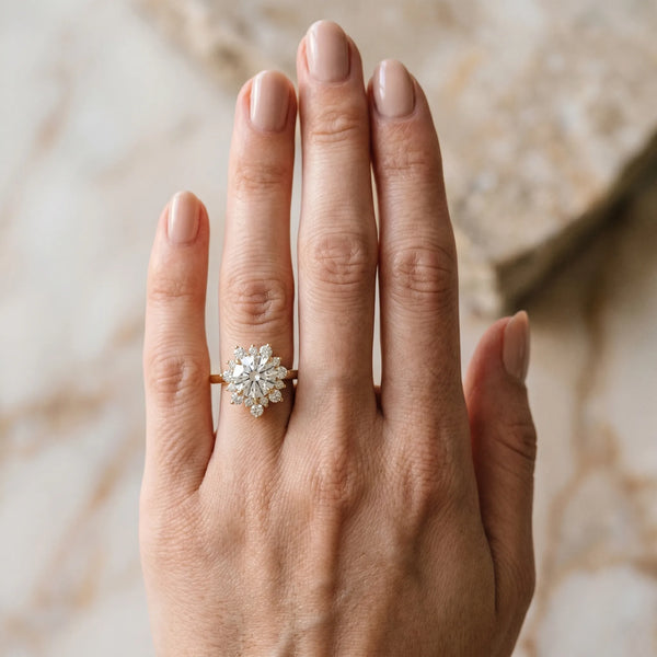 Yellow gold Pear-Cut Diamond Halo Solitaire Ring with Round Brilliant Halo and Prong Setting